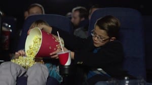 kids sharing popcorn